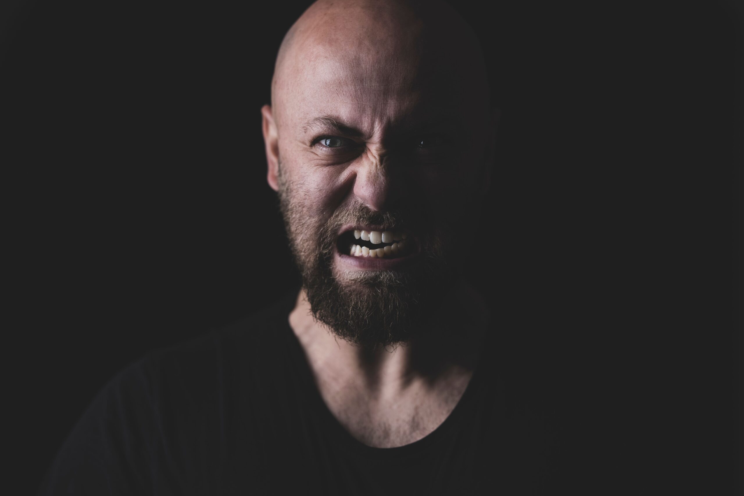 Man speaking openly during a supportive therapy conversation