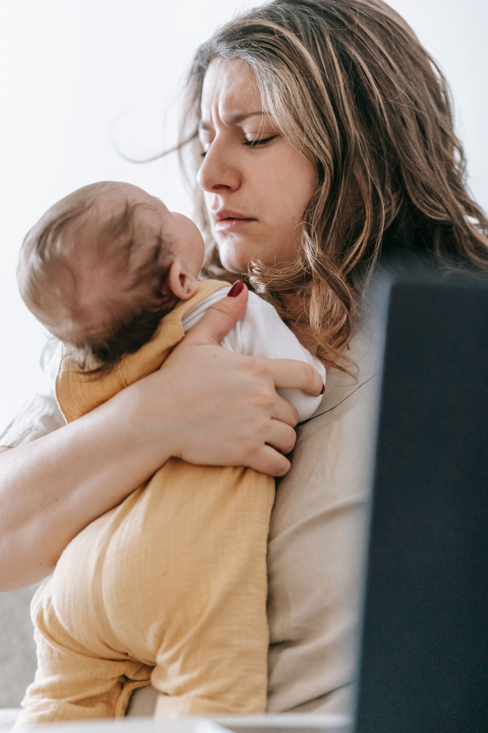 Mother gently caring for her baby
